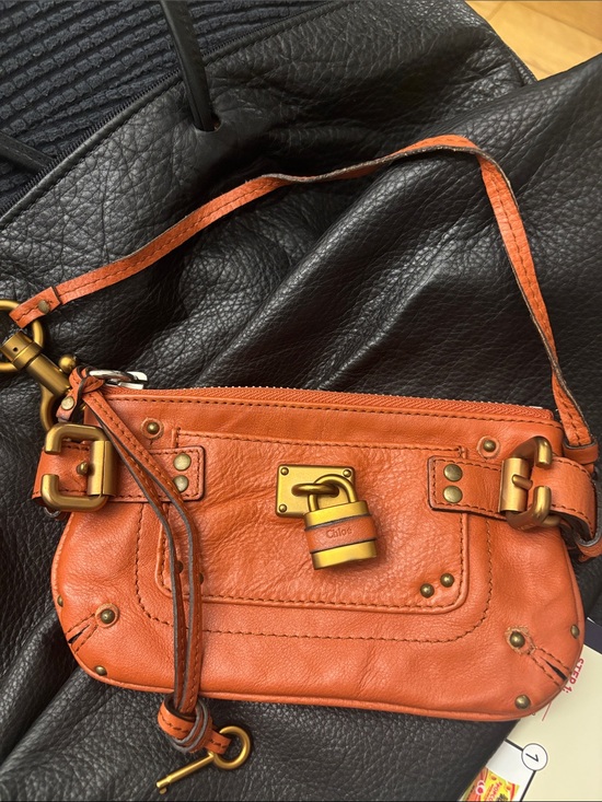 Chloe Handbags - Chloe orange paddington lock wristlet